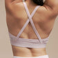 Back view of light pink cross back sports bra.