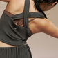 Back view of model wearing black Modal Pleated Dance Tank Top