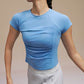 Model wearing light blue dance tee 