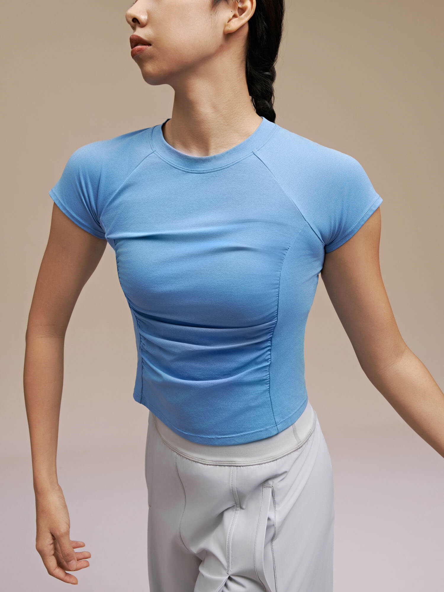 Model wearing light blue dance tee 