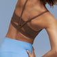 Closeup detail of back side of brown sports bra