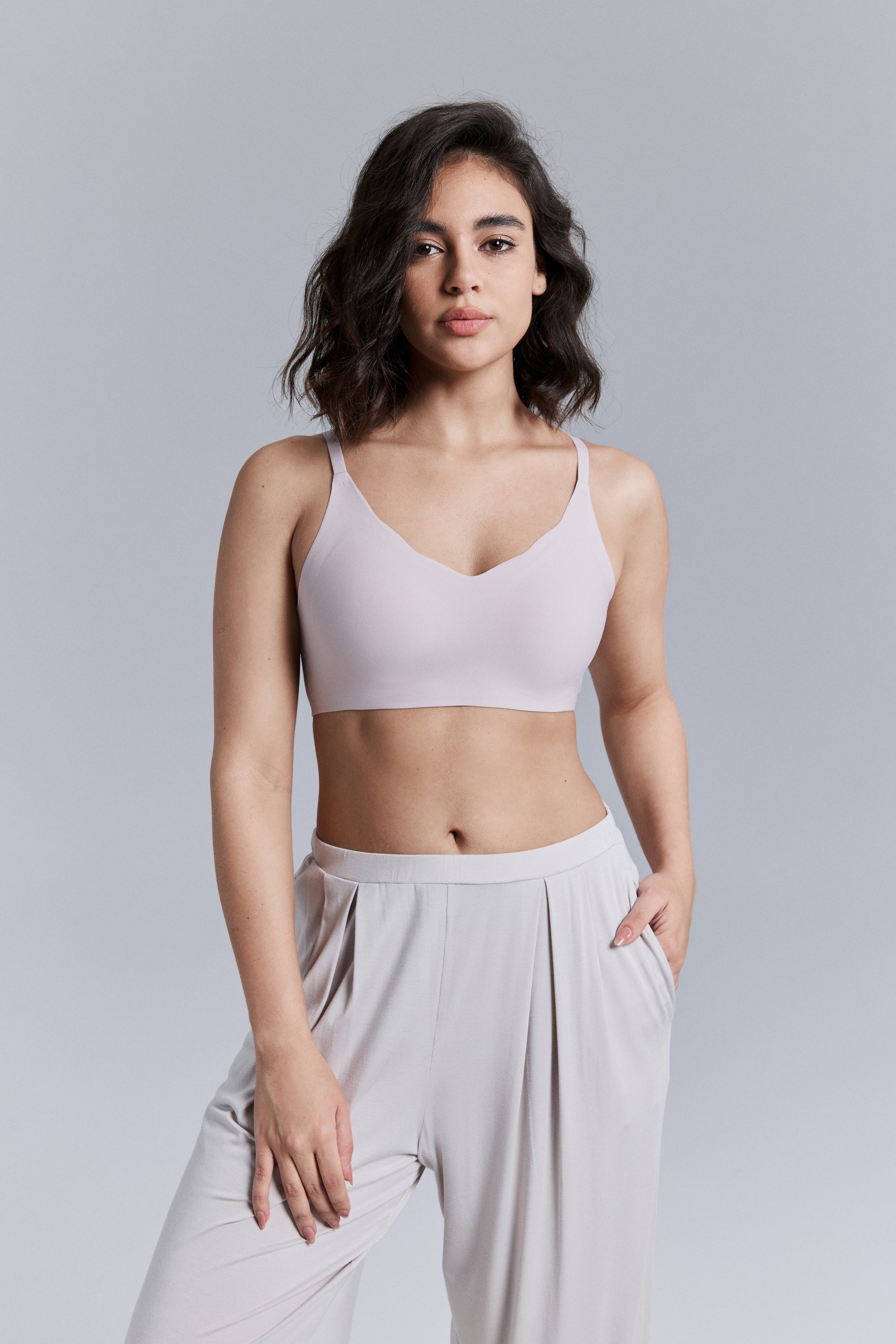 Model wearing a light purple bra and pants.