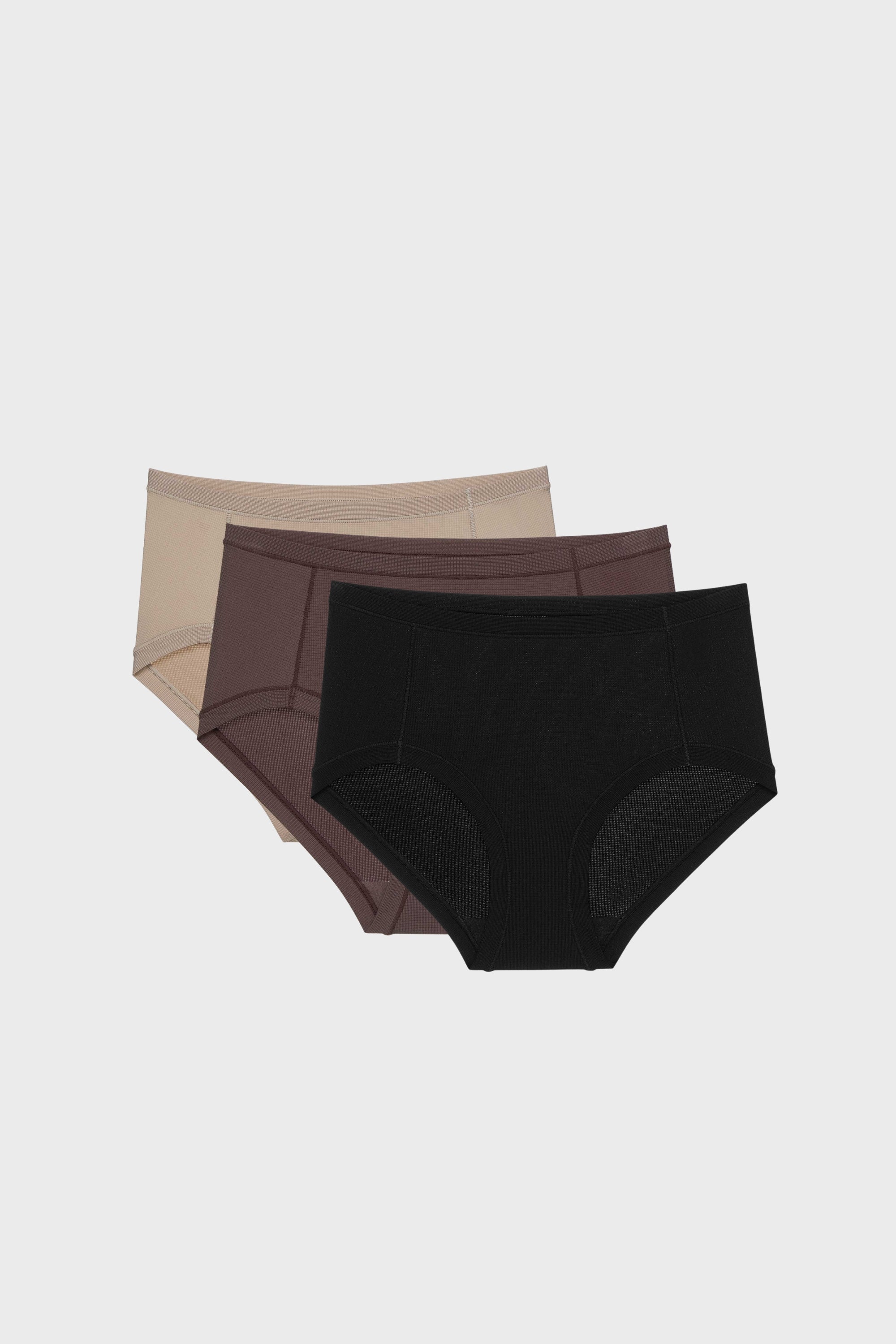 three briefs in tan, dark purple, and black