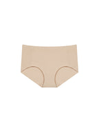 A pair of seamless high-waisted briefs in a light beige color, shown flat against a solid white background. Treacly Almond