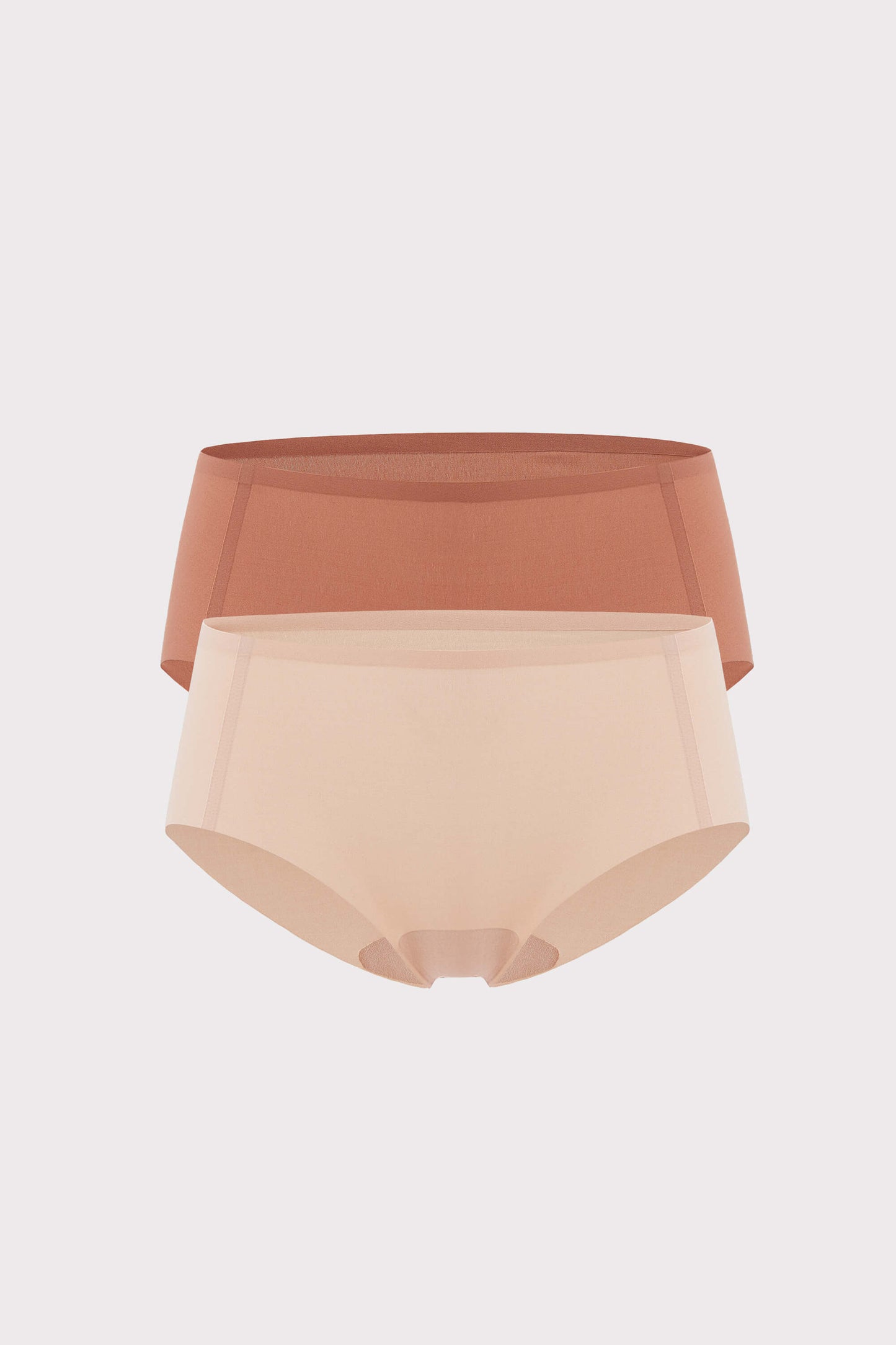 two briefs flat lay in rust and beige colors