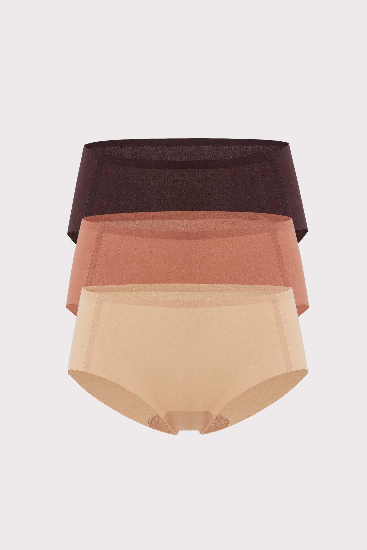 three briefs in brown, rust, and tan