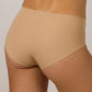 back of a woman in tan underwear