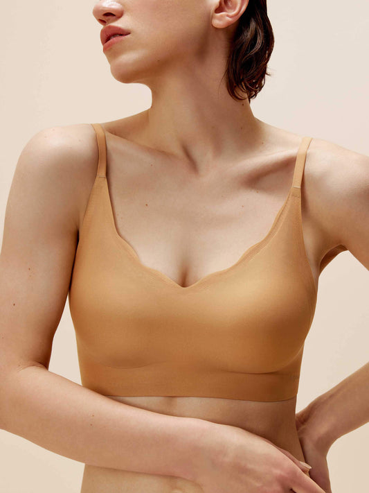 woman in caramel color bra with wavy rim details