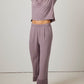 woman in purple pajama t-shirt and matching pants