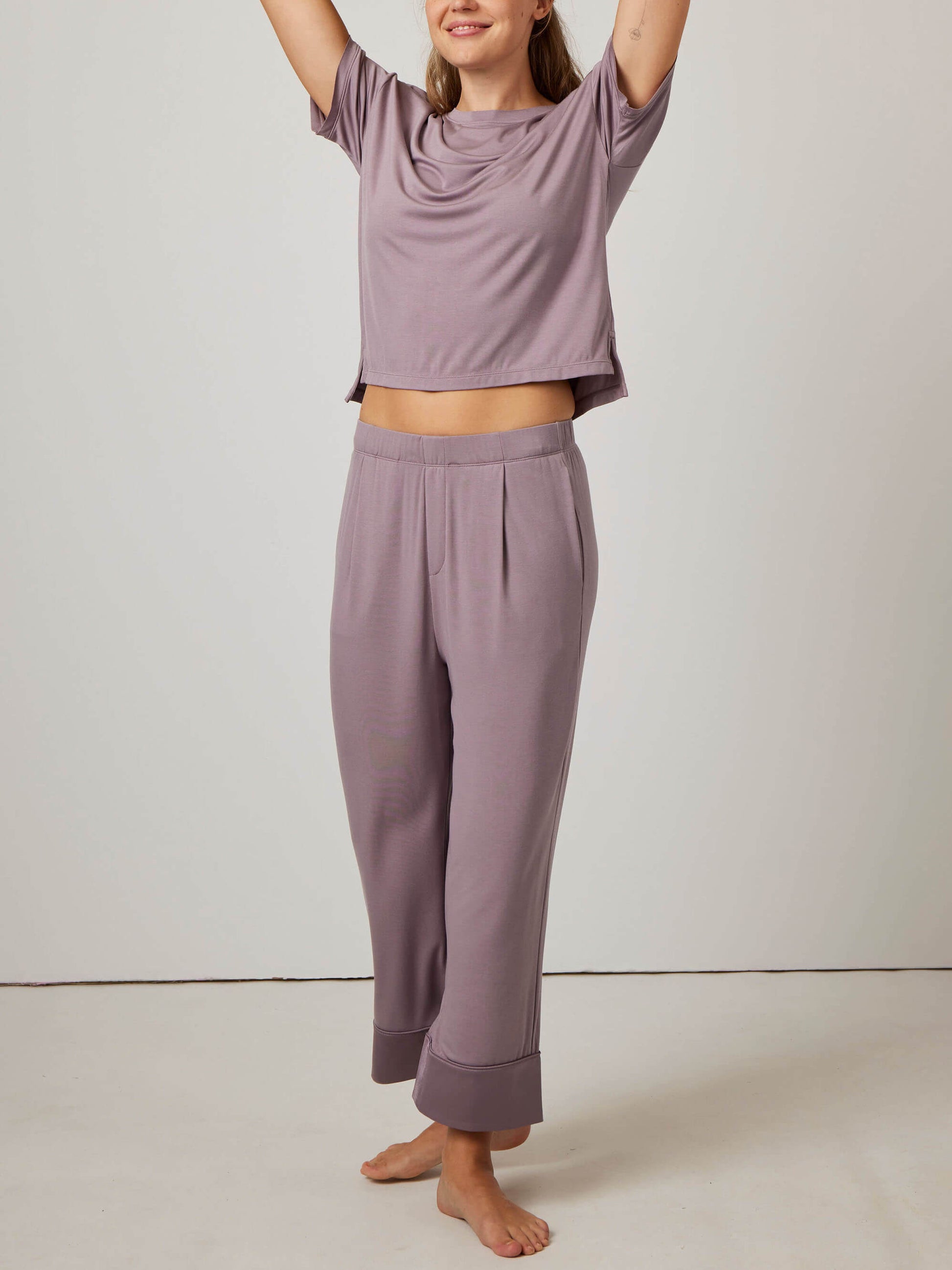 woman in purple pajama t-shirt and matching pants