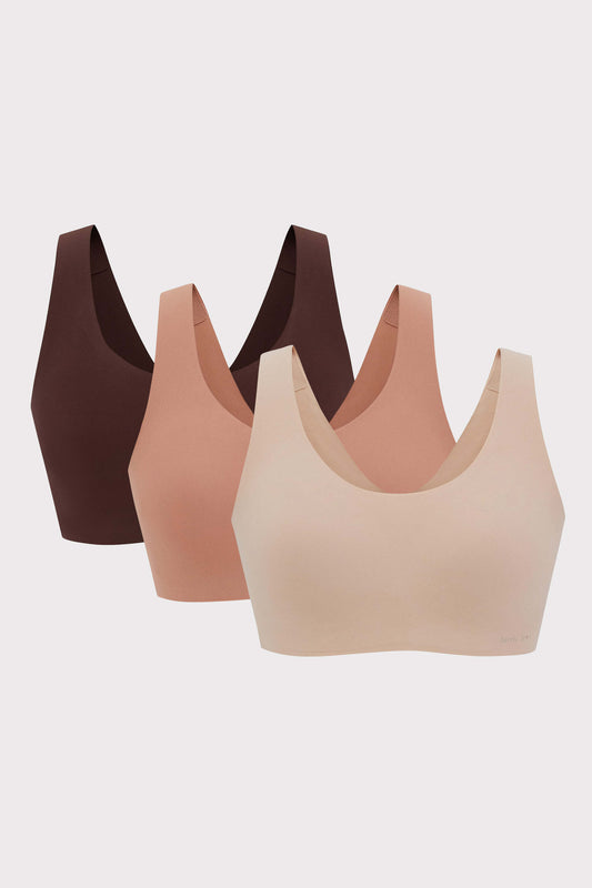Three Barely Zero Classic Bra Trios in gradient shades of brown displayed against a light background, arranged from dark left to light right, showcasing varying cup styles and sizes, all crafted with the CloudFit nylon blend for a comfortable fit.