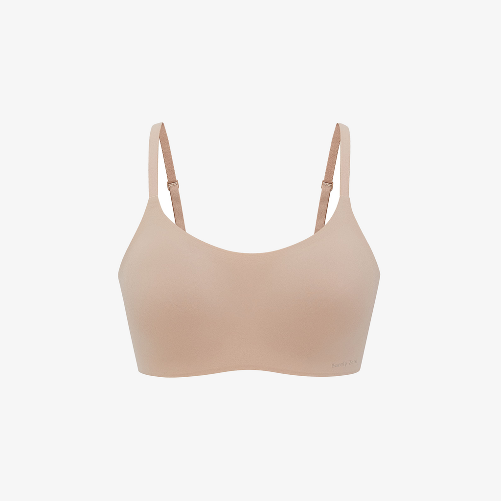 The Barely Zero Spaghetti Strap Bra - TikTok features a nude color, CloudFit comfort, and adjustable thin straps—making it the perfect everyday bra. Displayed on a plain white background.