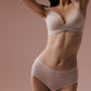 Full body view of model wearing light mauve bra and brief set