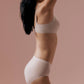 Side view of model wearing light mauve bra and brief set