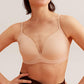 Front view of model wearing nude bra 