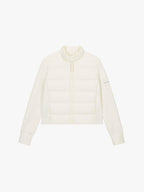 Flat lay of white cropped jacket