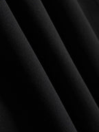 fabric detail of black leggings