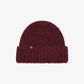 flat lay of burgundy beanie