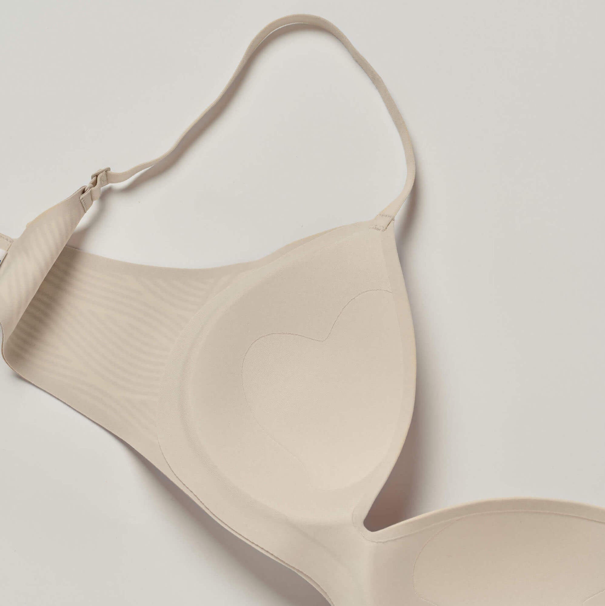 Beige bra on a light gray background