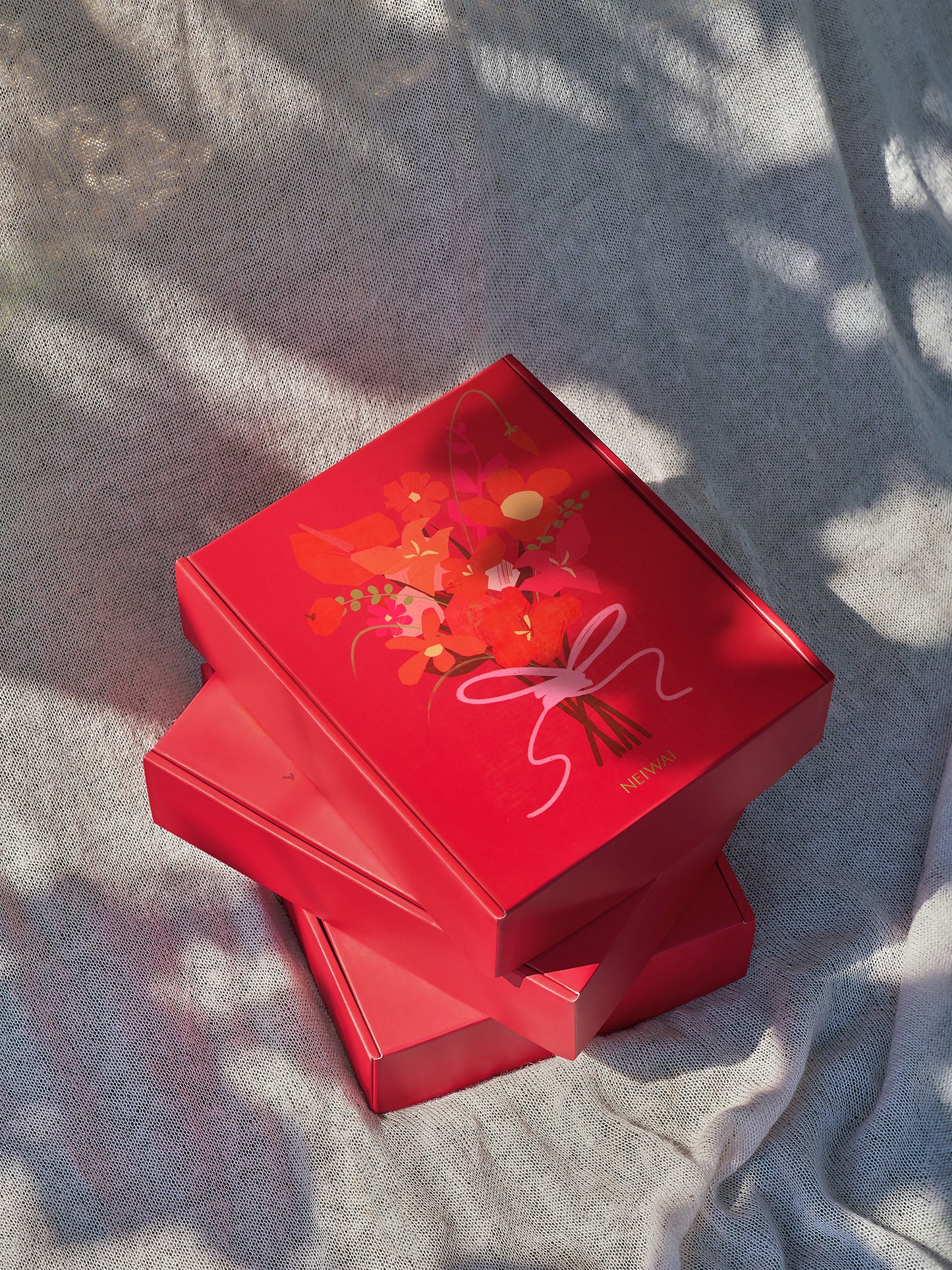 Red gift box with floral decoration