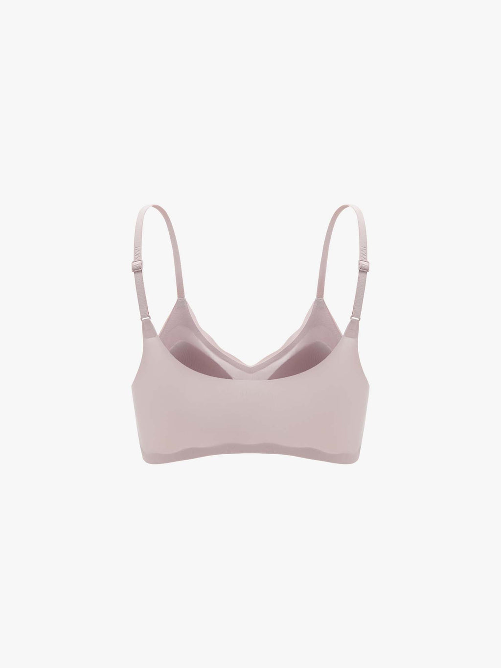 Light pink bra on a white background