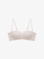 Flat lay of white strapless bra. Sliver Peony color.