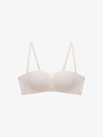 Flat lay of white strapless bra.