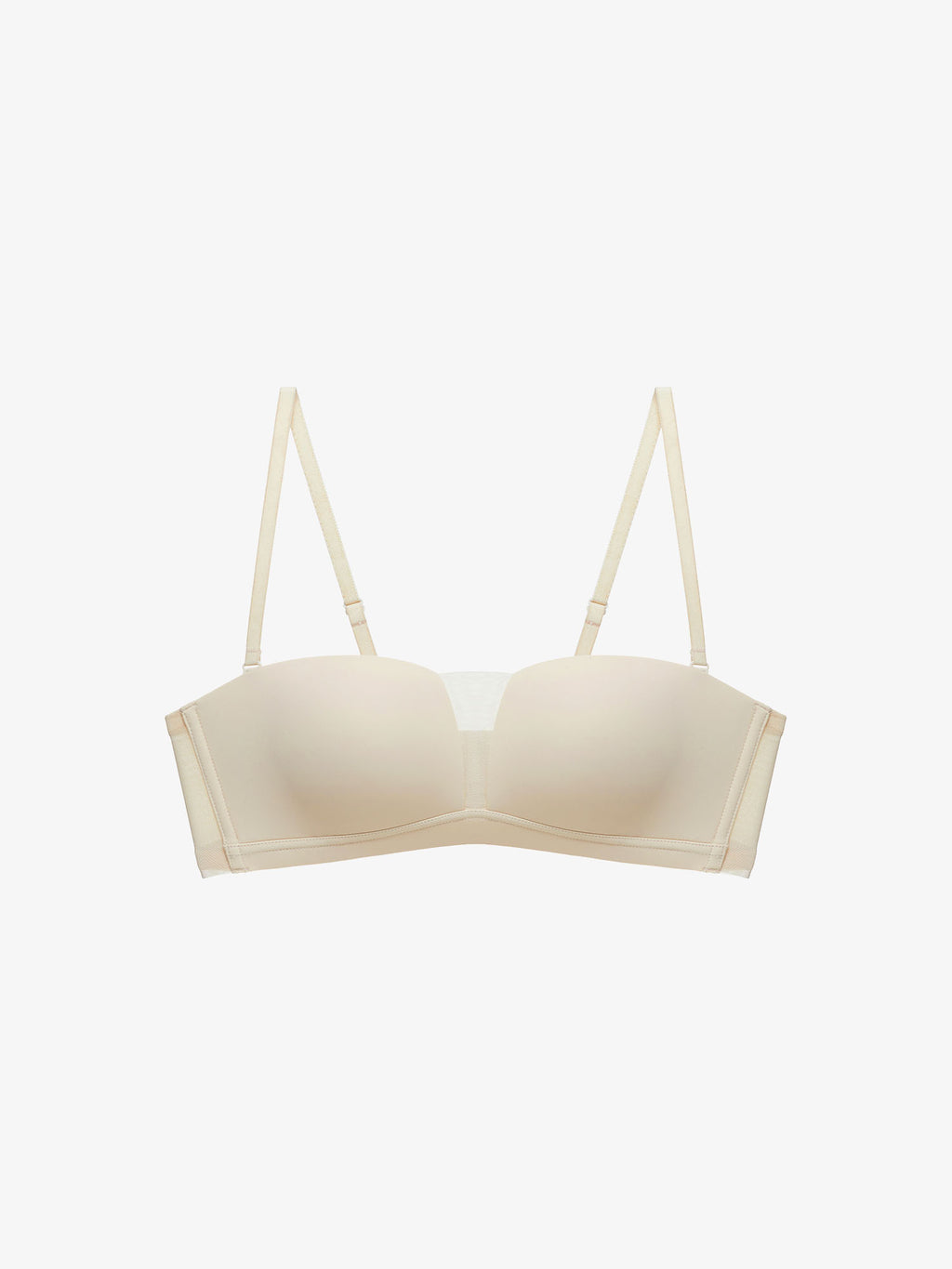Flat lay of beige strapless bra.
