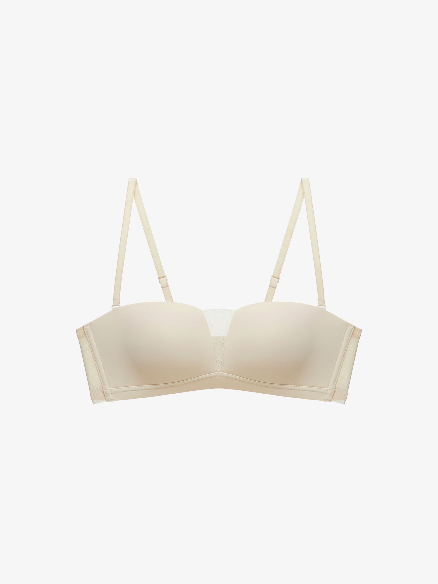Flat lay of beige strapless bra.
