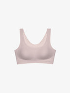 Light pink bralette on a white background