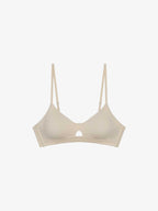 Beige bra on a white background