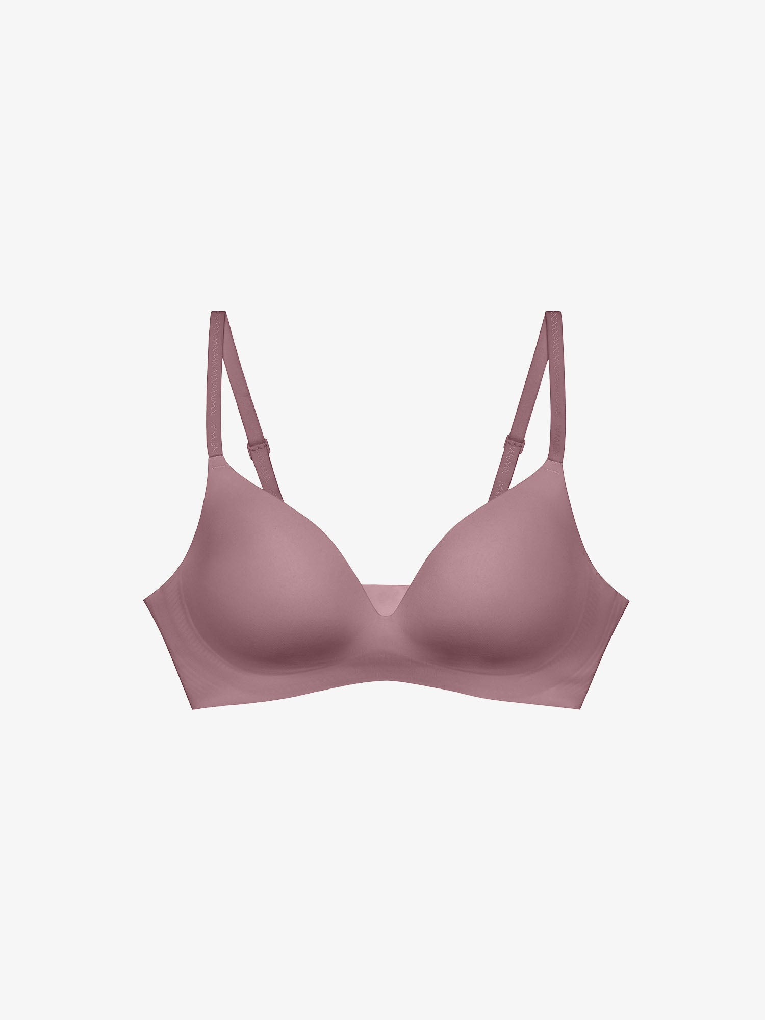 Flat lay of light pink bra. 