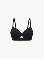Black bra on a light gray background. Black