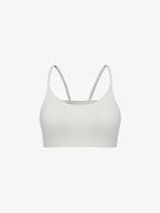 Flat lay of white sports bra 