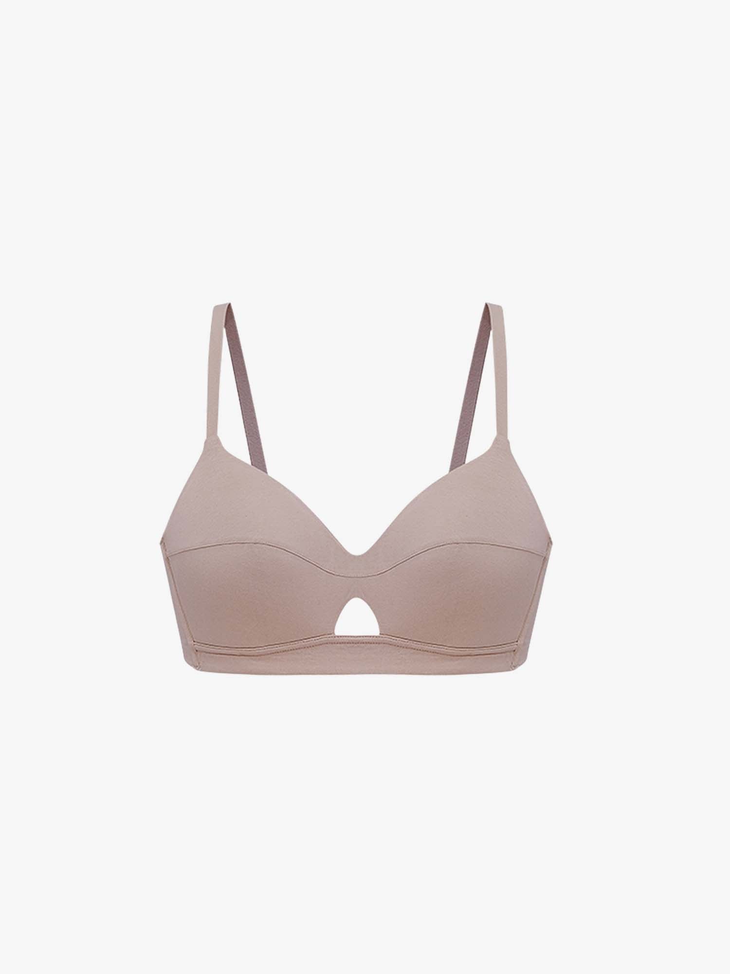 Beige bra on a light beige background. Nude Pink