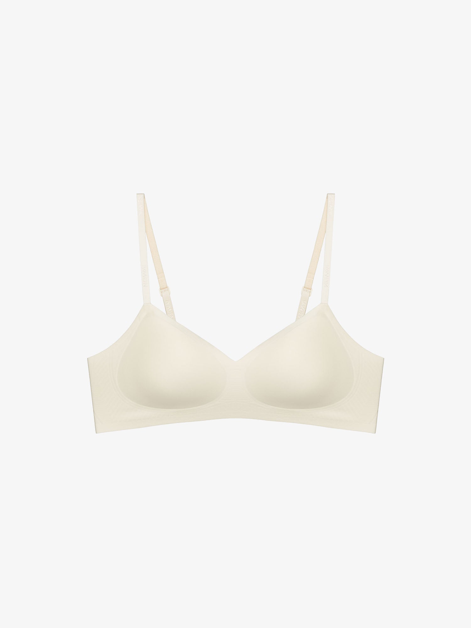 Flat lay of light cream colored bra 