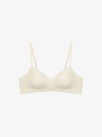 Flat lay of light cream colored bra 