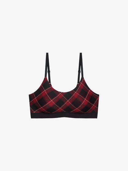 Flat lay of plaid-patterned bralette on a white background.