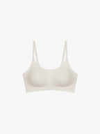 Flat lay of white barely zero bra. Eggwhite color.