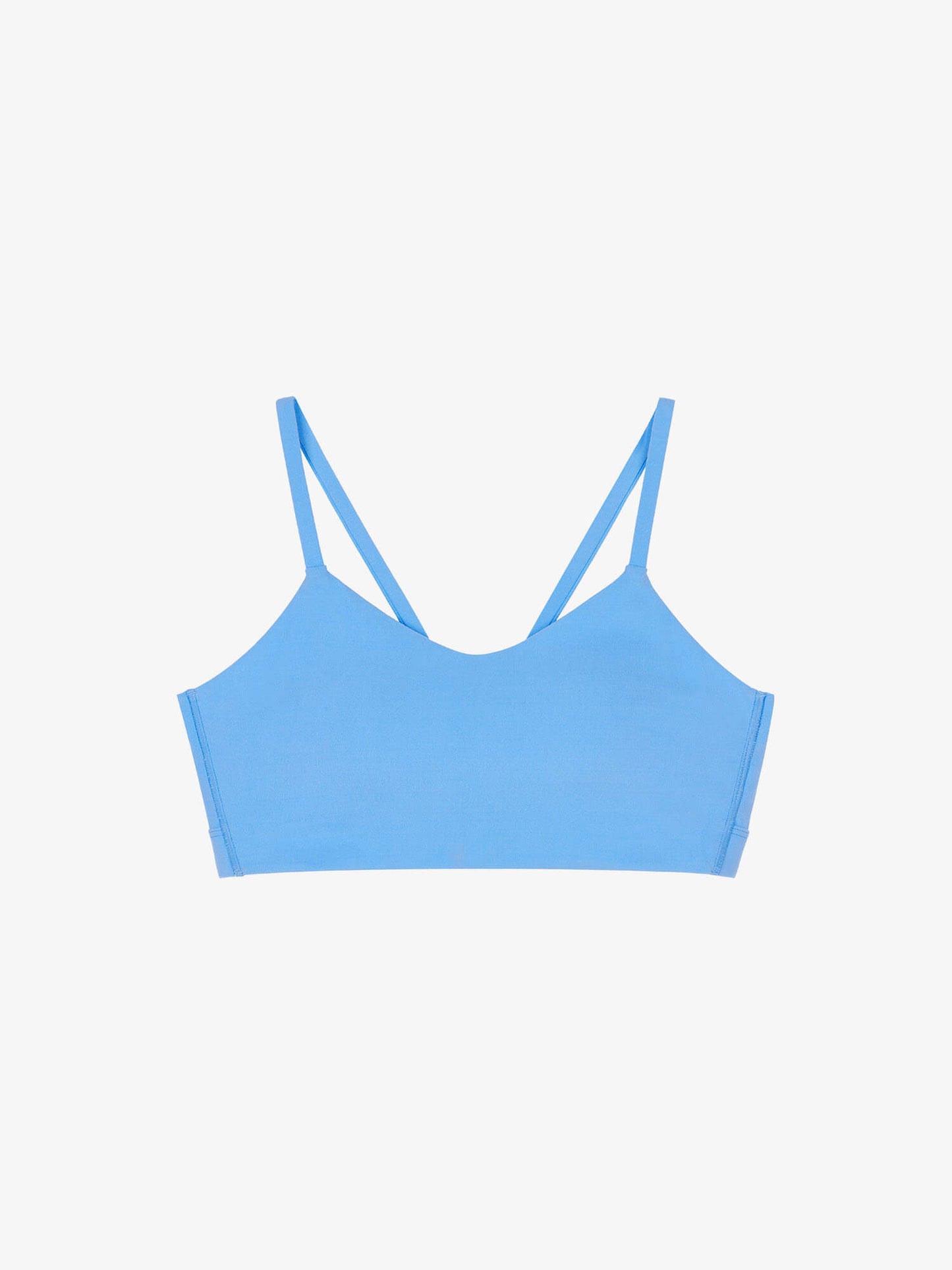 Flat lay of light blue sports bra