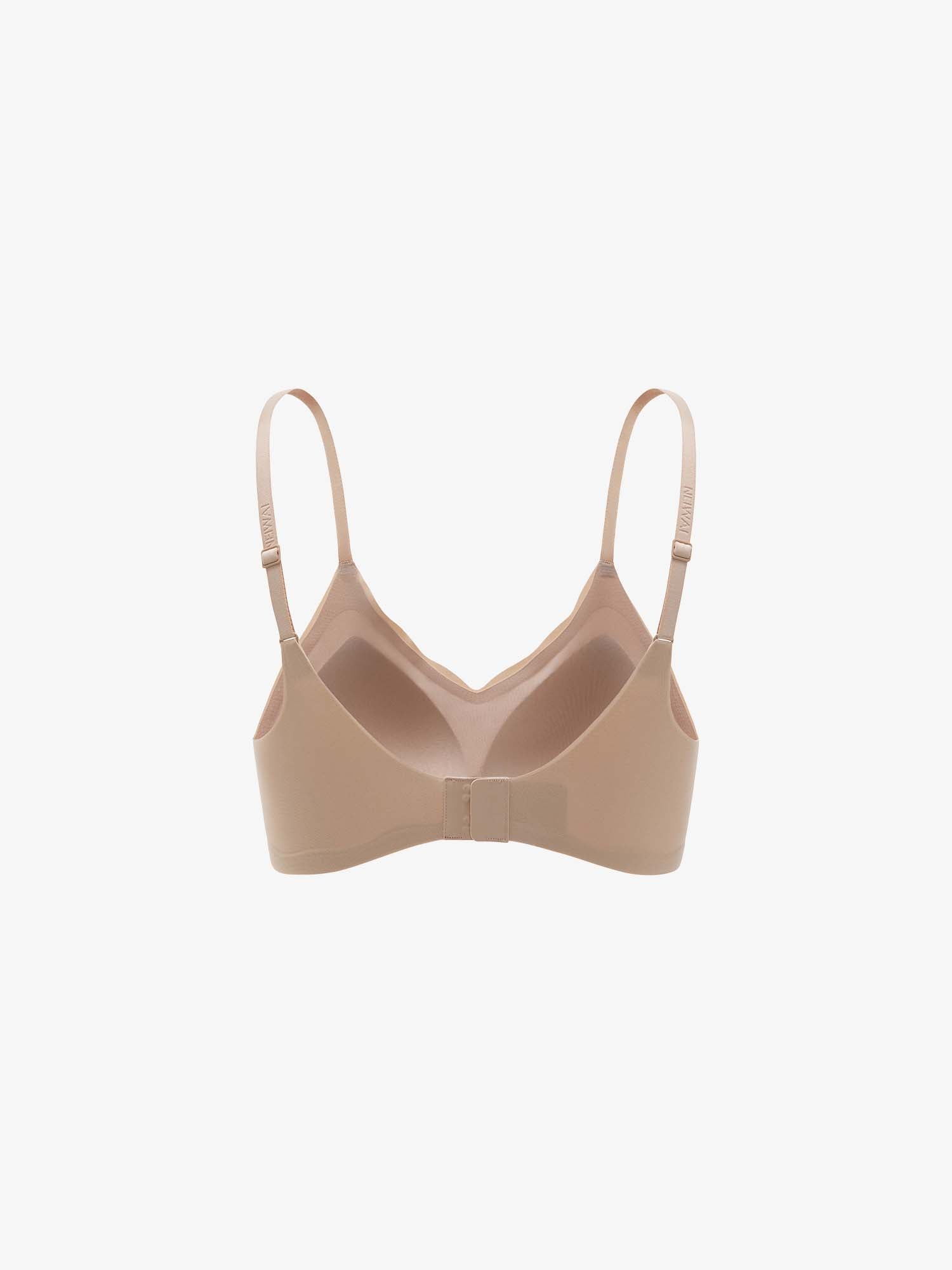 Beige bra on a light beige background. Treacly Almond color.