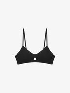 Flat lay of black bra with keyhole detailing