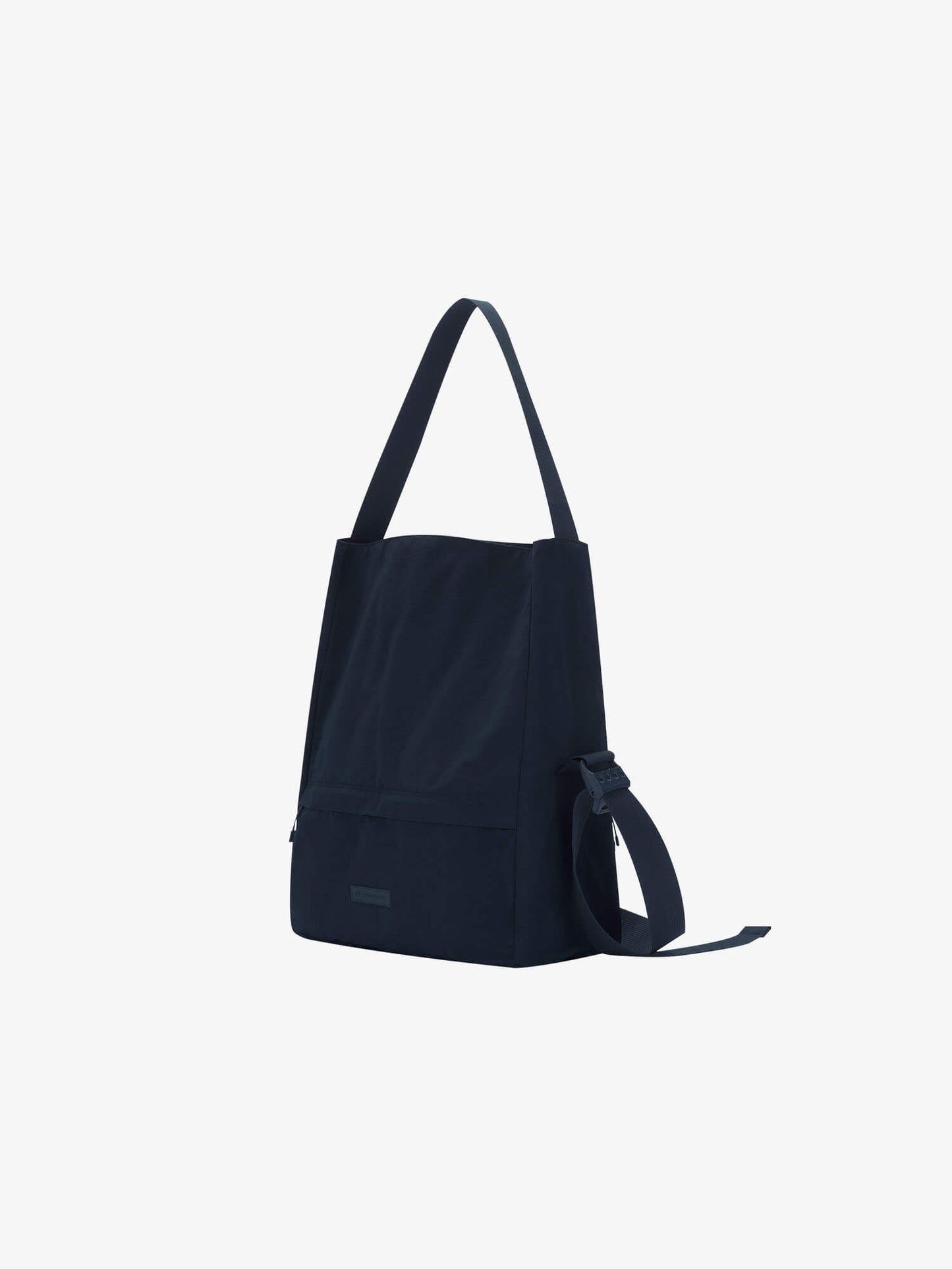 Side view of navy convertible bag