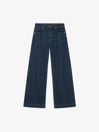 Flat lay of dark blue denim jeans.