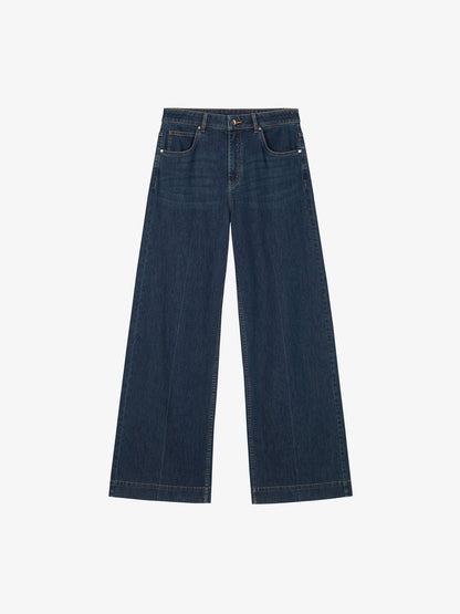 Flat lay of dark blue denim jeans.