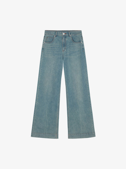 Flat lay of light blue denim jeans.