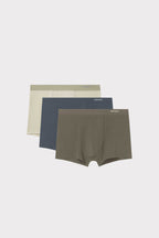 three briefs in cream, steel blue, and dark grey
