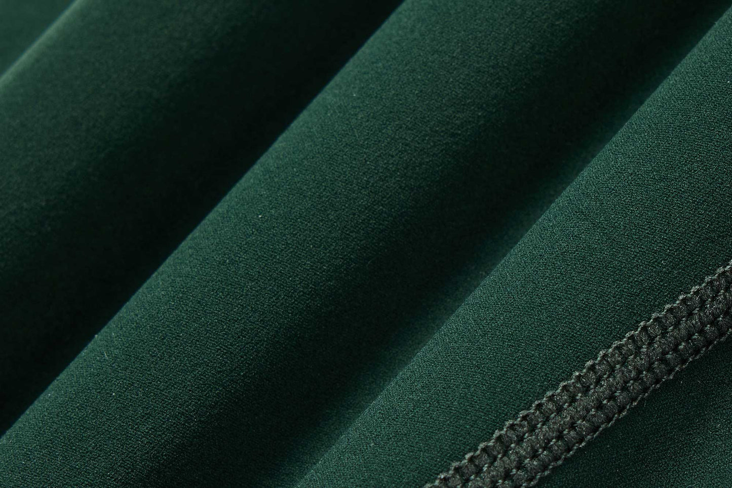 fabric detail of green drawstring leggings