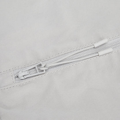 zip detail on grey bag