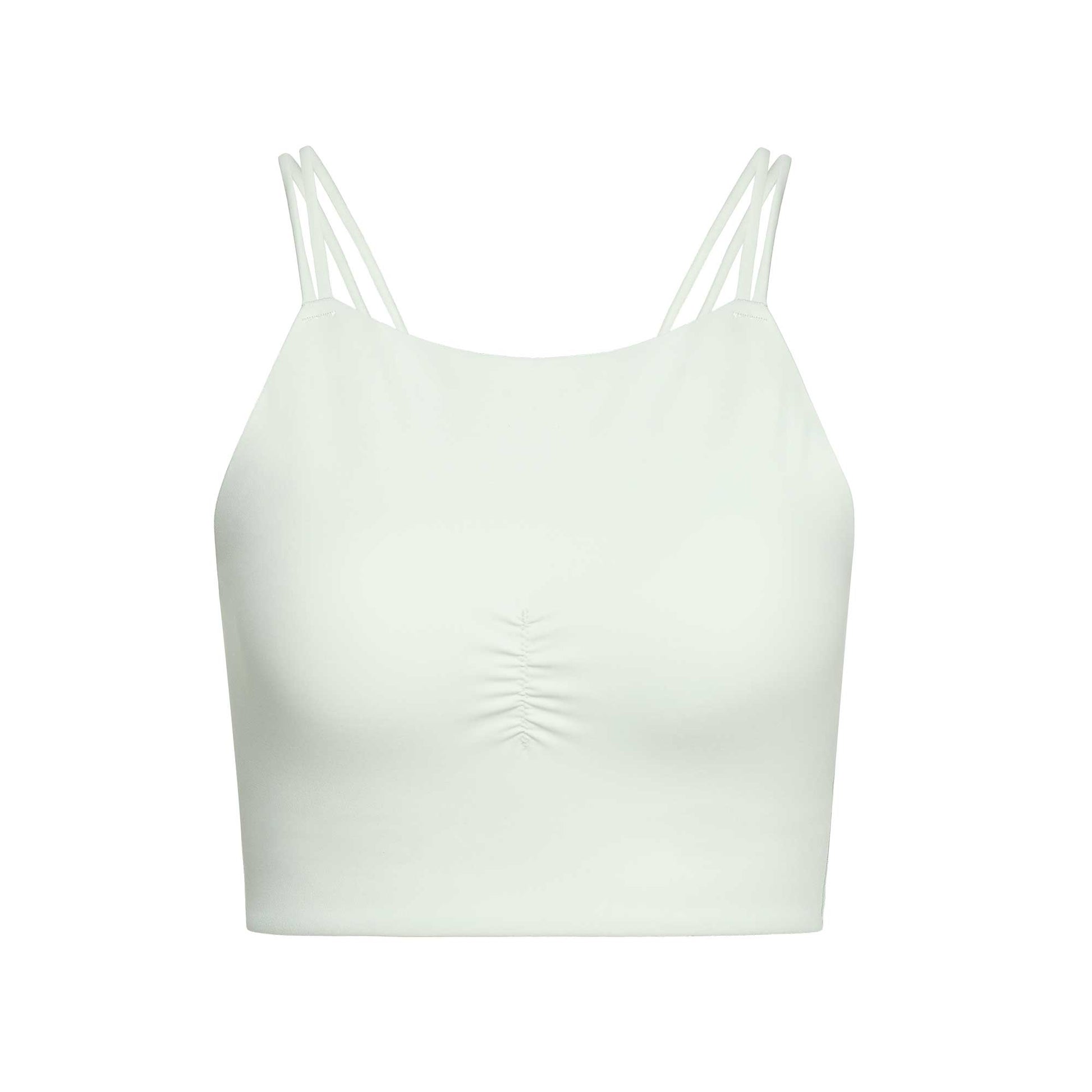 flat lay of white sports bra